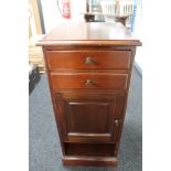 An Edwardian mahogany bedside cabinet