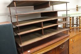 A bobbin style stool together with an office rack system