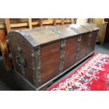 A nineteenth century oak metal domed shipping trunk