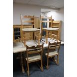 A blonde oak refectory dining table and six chairs