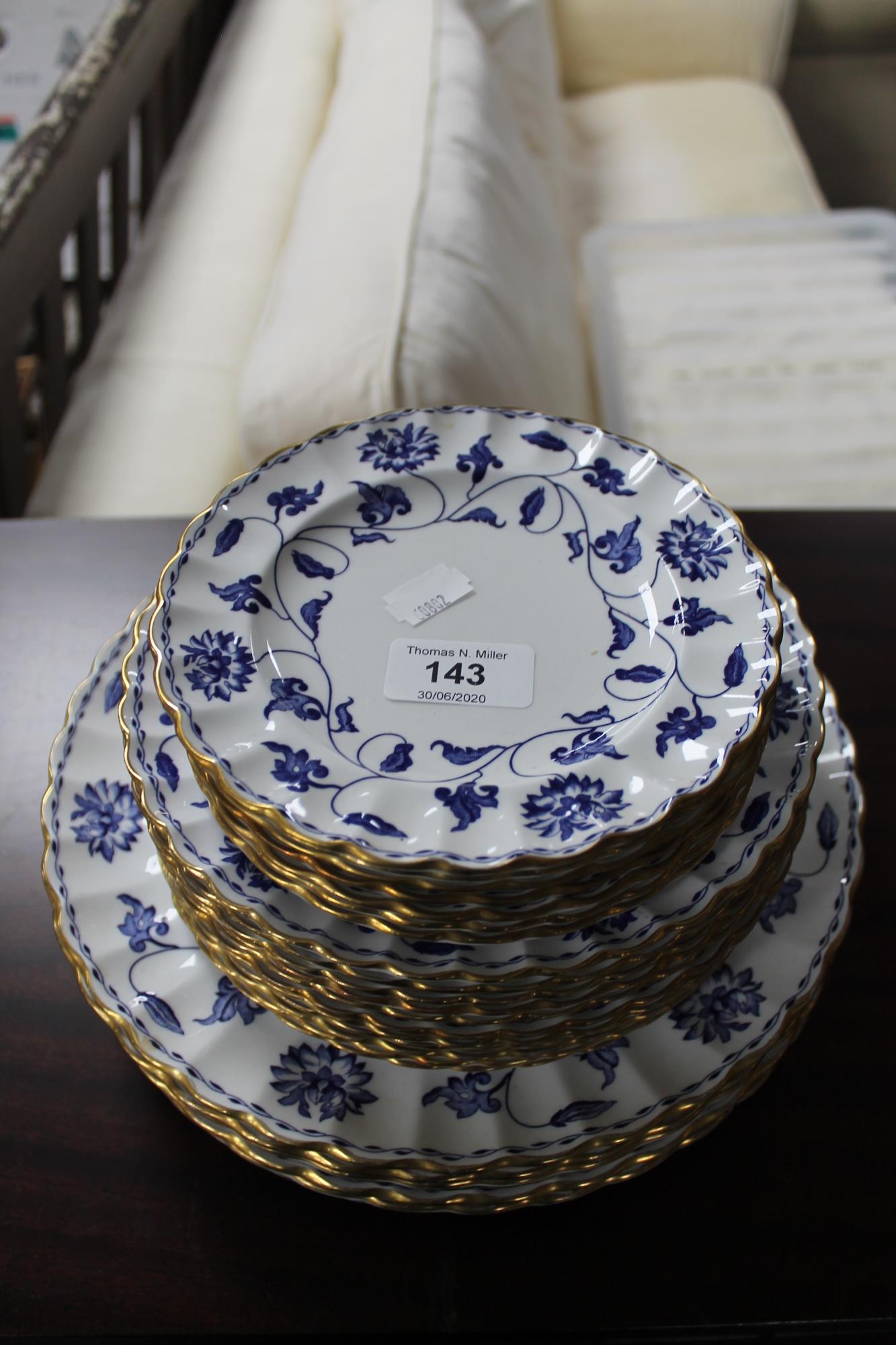 A quantity of Spode Blue Colonel blue and white gilded plates