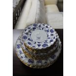A quantity of Spode Blue Colonel blue and white gilded plates