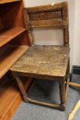 An antique low chair together with a hat & coat stand