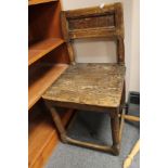 An antique low chair together with a hat & coat stand