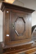 A nineteenth century oak wall cabinet