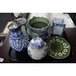 A tray of lattice work blue and white vases,