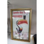 Seven gilt framed Guinness advertisements