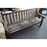 A large wooden garden bench