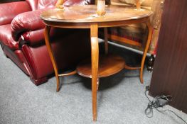 A Victorian mahogany two tier occasional table