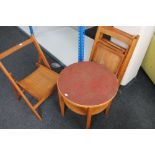 Four vintage folding chairs together with an occasional table