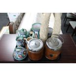 A tray of earthenware china, two oak biscuit barrels,