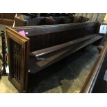 An oak pew. length 336 cm.