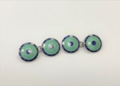 A pair of gent's silver and green/blue enamel cufflinks, Phillip Kydd, Birmingham 2011.