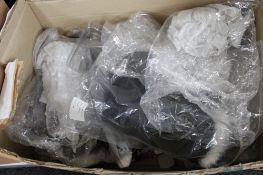 A box of Phaze Clothing - spider web tops etc