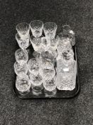 A tray of two glass decanters with stoppers, cut glass rummers,