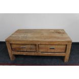 A sheesham wood two drawer low table