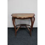 An Edwardian mahogany occasional table