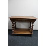 A nineteenth century oak side table