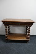 A nineteenth century oak side table