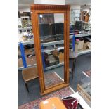 A large rectangular mahogany framed bevelled mirror