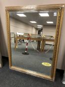 A golden framed mirror