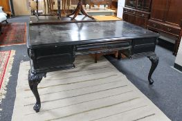 A nineteenth century stained pine desk