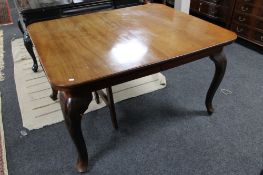 A nineteenth century mahogany dining table