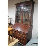 A George III mahogany bureau bookcase