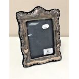 A silver easel photograph frame, height 21.5 cm, London marks.