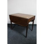 An inlaid mahogany Victorian Pembroke table CONDITION REPORT: Historic split to top