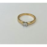 An 18ct gold princess cut diamond solitaire ring, size N.