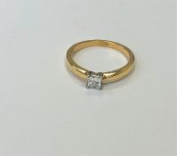 An 18ct gold princess cut diamond solitaire ring, size N.