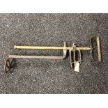 An antique brass and cast iron garden sprayer