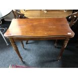 A nineteenth century mahogany tea table CONDITION REPORT: Legs rather wobbly.