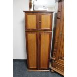 A mahogany double door side cabinet