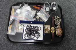 Costume jewellery, wristwatches, amber cheroot, cutlery including silver spoon,