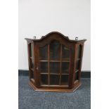 An oak display cabinet