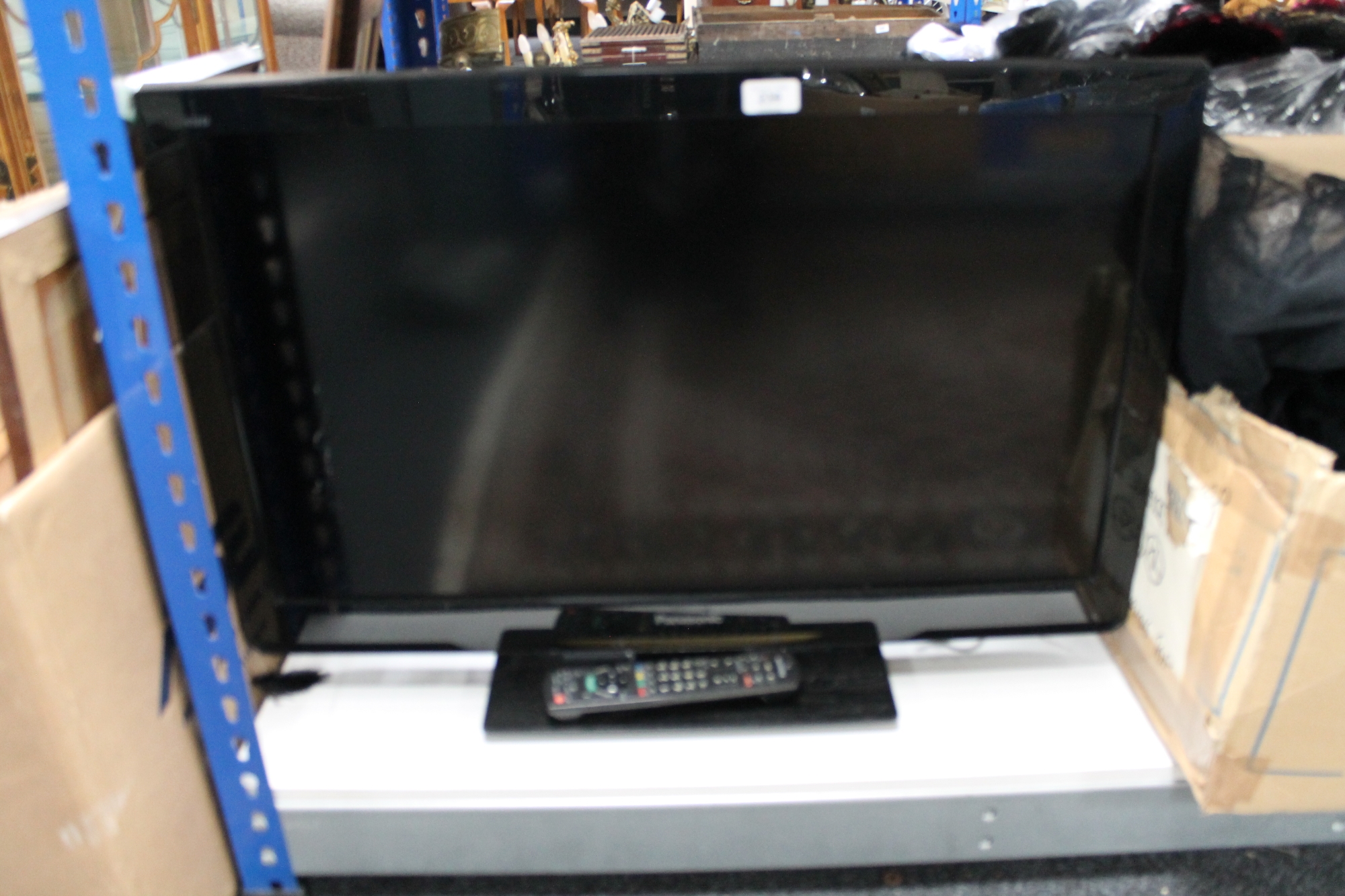 A Panasonic Viera TX-L32CX3E 32 inch LCD TV with remote