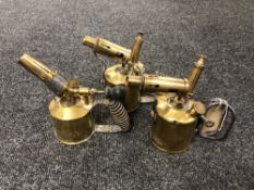 Three antique brass blow torches