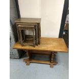 An oak coffee table and a nest of tables