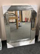 A four-bar all glass mirror