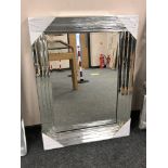 A four-bar all glass mirror