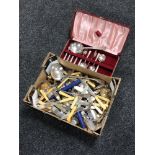 A box of loose silver plated cutlery,