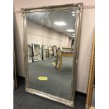 A silvered swept mirror