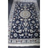 A Nain design rug,