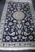 A Nain design rug,