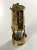 A vintage brass Eccles type 6 Miner's lamp