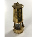 A vintage brass Eccles type 6 Miner's lamp