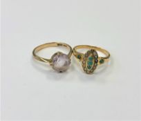 An 18ct gold turquoise and seed pearl ring and a 9ct gold dress ring.