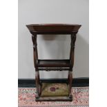 A Victorian mahogany two tier stand